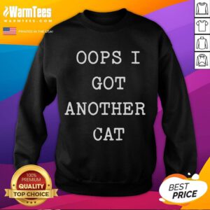 Funny 'Oops I Got Another Cat' sweatshirt featuring a playful cat graphic, perfect for cat lovers and humor enthusiasts.
