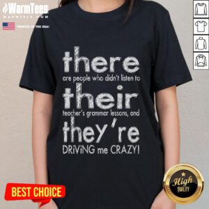 Funny 'There, Their, Theyre Driving Me Crazy' tee for English teachers, featuring playful text on a stylish ladies' shirt.