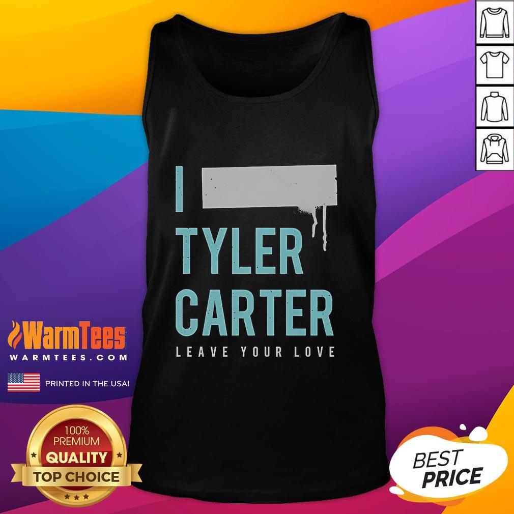 Tyler Carter wearing a stylish 'Leave Your Love' tank top, showcasing a trendy and casual summer outfit.