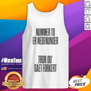 Alt Text: Nice Tessa wearing a trendy tank top, showcasing confidence and style in a casual setting.