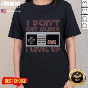 Retro gamer ladies tee featuring 'I Don't Get Older, I Level Up' design, perfect for gaming enthusiasts and stylish outfits.
