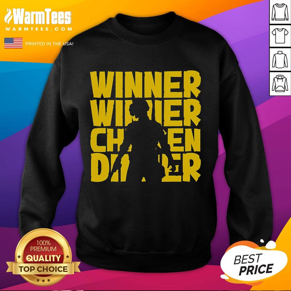 Alt Text: Silhouette of a PUBG player celebrating victory in an 'Awesome Winner Winner Chicken Dinner' sweatshirt.