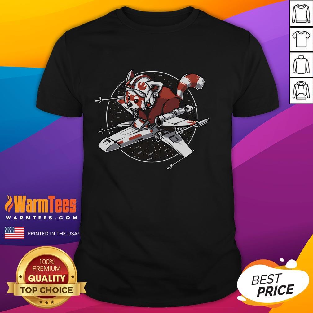 Alt Text: Cute red panda in Star Wars attire standing by a t-shirt design, perfect for fans of both red pandas and Star Wars.