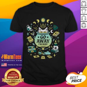 Alt Text: Cute witch cat at work on a Go Away I'm Busy T-shirt, perfect for cat lovers and Halloween enthusiasts.