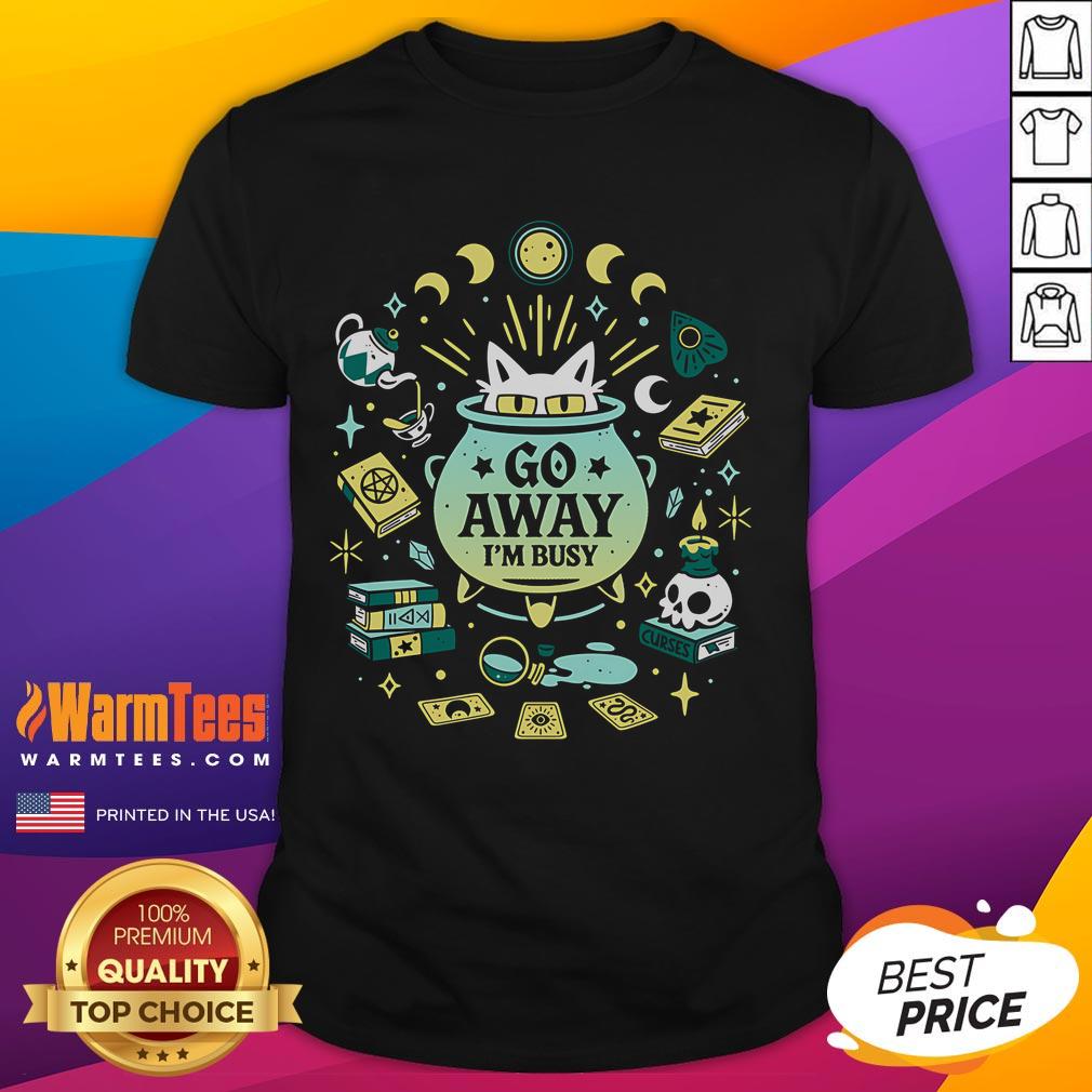 Alt Text: Cute witch cat at work on a Go Away I'm Busy T-shirt, perfect for cat lovers and Halloween enthusiasts.