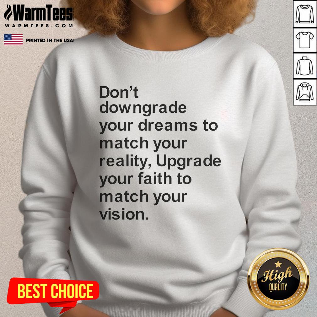 Motivational sweatshirt with 'Don't Downgrade Your Dreams to Match Your Reality' text, perfect for inspiring confidence.