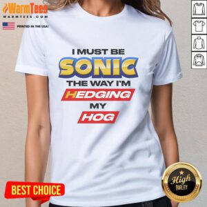 Funny ladies' tee featuring 'Good I Must Be Sonic' and playful hedgehog design, perfect for Sonic fans.