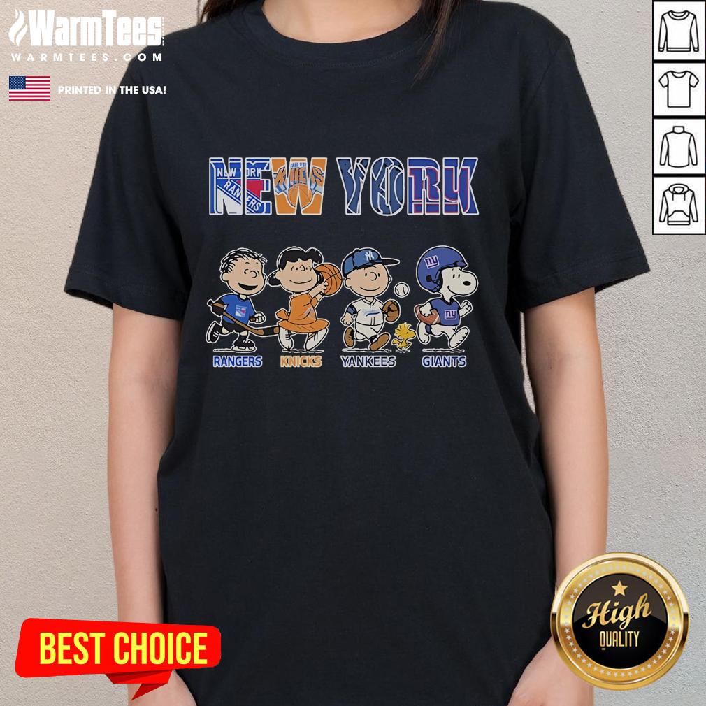 Alt Text: Official Peanuts New York Rangers Knicks Yankees Giants Ladies Tee featuring iconic cartoon designs and team logos.
