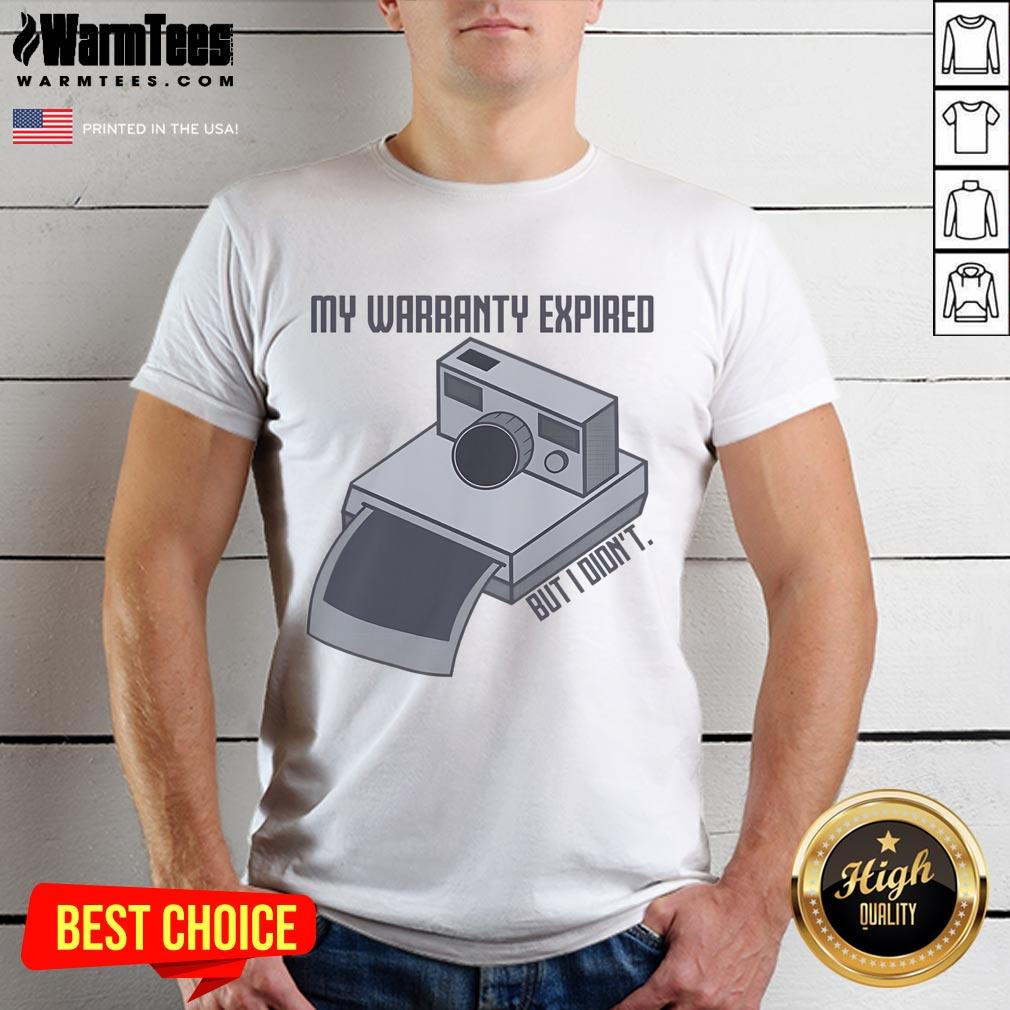 Alt Text: Vintage instant camera t-shirt featuring the phrase My Warranty Expired But I Didnt in a fun design.