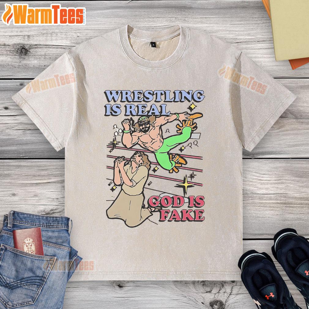 Awesome wrestling is real God is fake washed t-shirt displayed on a hanger, perfect for wrestling fans and casual wear.