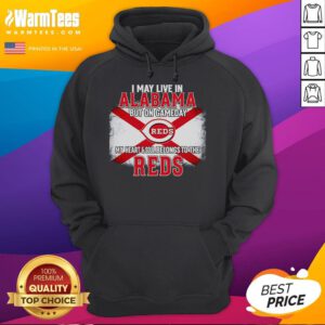 Person wearing a Reds hoodie, showcasing team spirit in Alabama on game day, highlighting loyalty to the Reds.