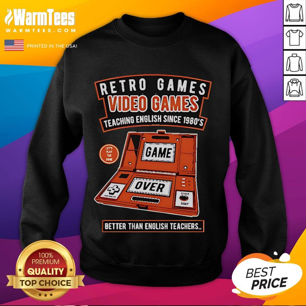 Cozy sweatshirt design featuring retro video games, promoting fun English learning since the 1980s, better than teachers.