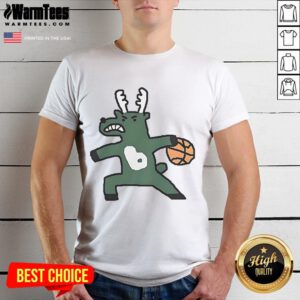 Official Milwaukee Bucks NBA basketball dribbling T-shirt featuring vibrant team colors and logo for fans and players.