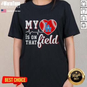 Alt Text: Official My Heart Is On That Field baseball tee for ladies featuring Los Angeles Dodgers logo and design.