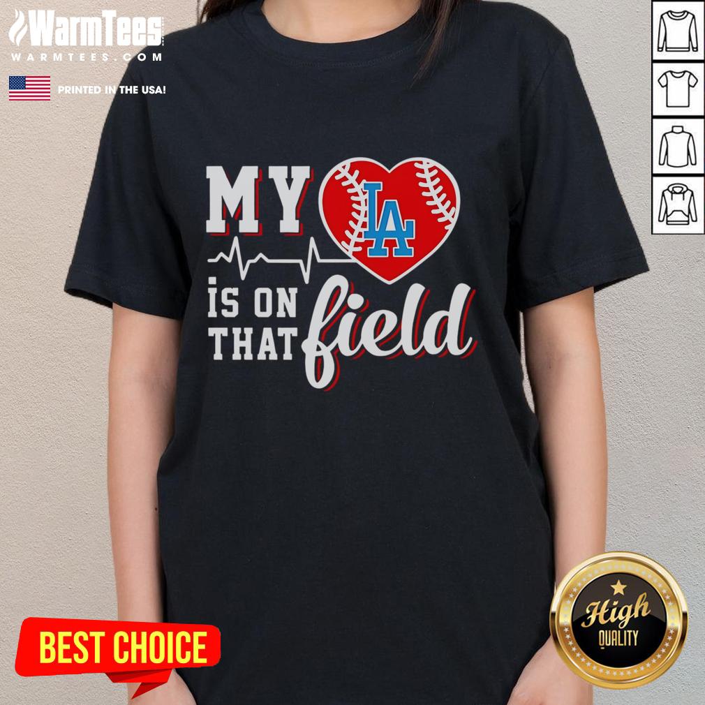 Alt Text: Official My Heart Is On That Field baseball tee for ladies featuring Los Angeles Dodgers logo and design.