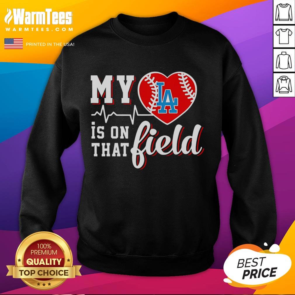 Los Angeles Dodgers sweatshirt with 'My Heart Is On That Field' design, perfect for baseball fans and game day attire.