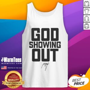 Pastor Mike Jr. wearing a 'God Showing Out' tank top, showcasing faith and style in a vibrant, uplifting setting.