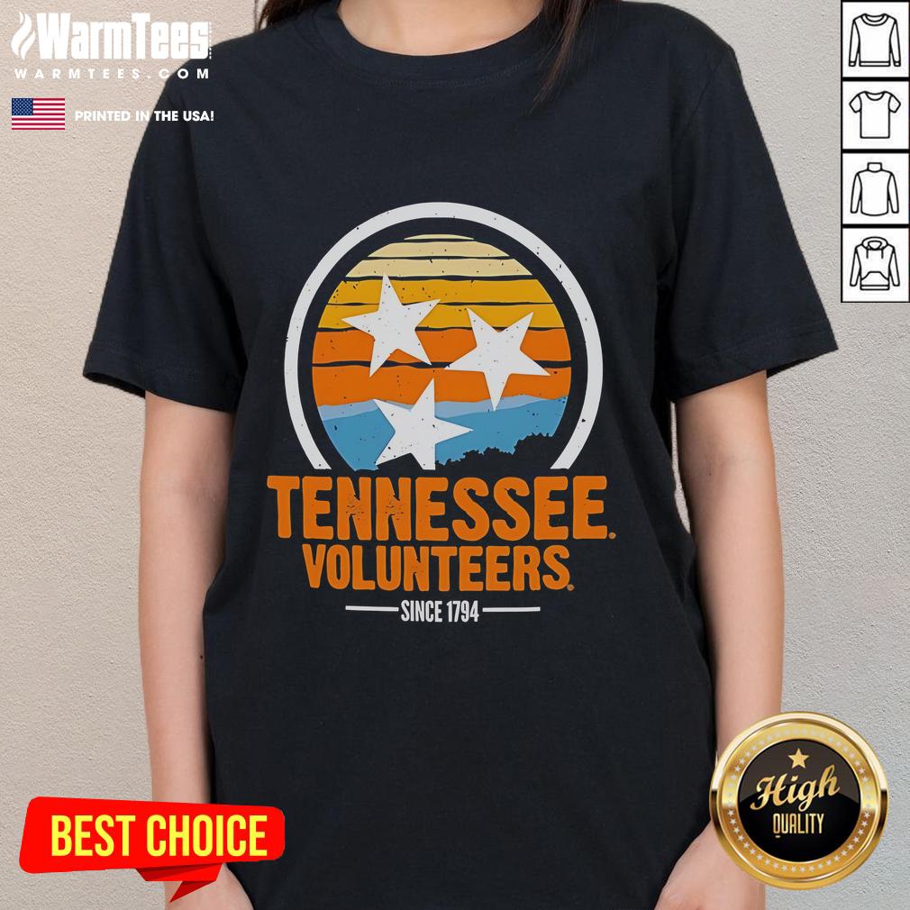 Alt Text: Vintage ladies tee featuring the official Tennessee Volunteers logo, established since 1794, perfect for fans.
