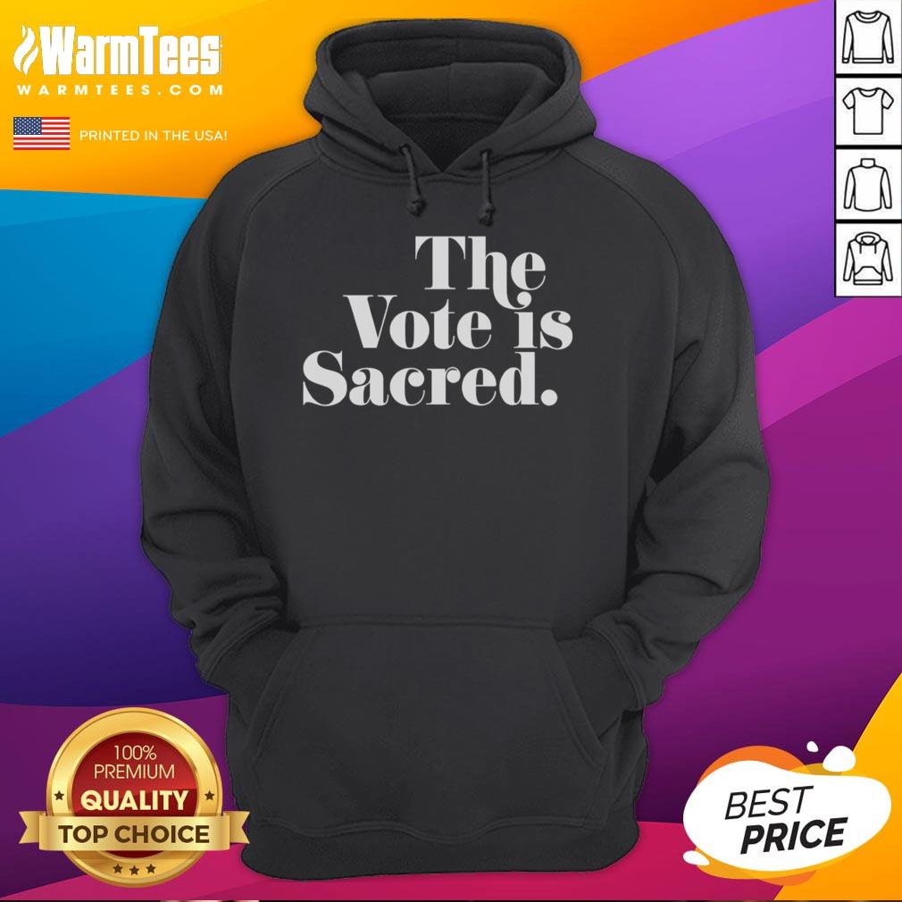 Alt Text: Official The Vote Is Sacred Hoodie in black, promoting voter engagement and civic responsibility.