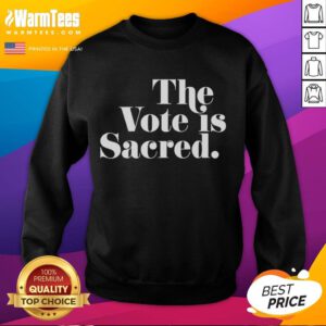 Alt Text: Official The Vote Is Sacred Sweatshirt featuring bold text design, perfect for promoting civic engagement and voter rights.