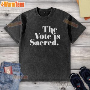 Alt Text: Official The Vote Is Sacred washed t-shirt featuring bold lettering, perfect for promoting voter awareness and engagement.