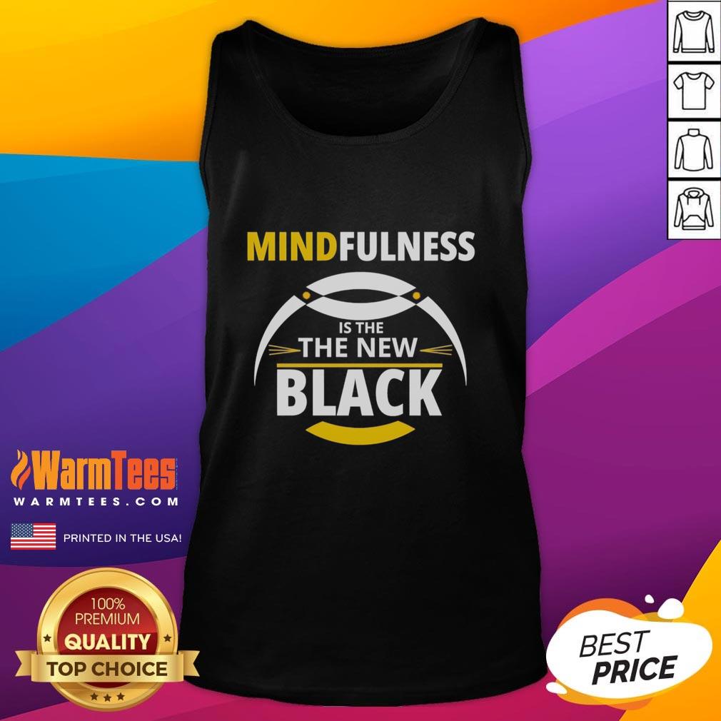Model wearing a black tank top featuring 'Mindfulness is the New Black' slogan, perfect for casual and active wear.