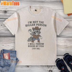 Funny cowboy raccoon on a washed T-shirt with the phrase I'm not the bigger person, I will throw rocks at you.