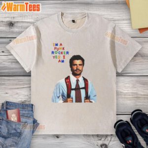 Alt Text: Funny David Corenswet wearing a punk rocker Yes I Am washed t-shirt, showcasing his playful style and personality.