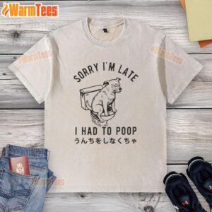Funny dog wearing a Sorry I'm Late, I Had To Poop t-shirt, showcasing humor and canine charm in a playful setting.
