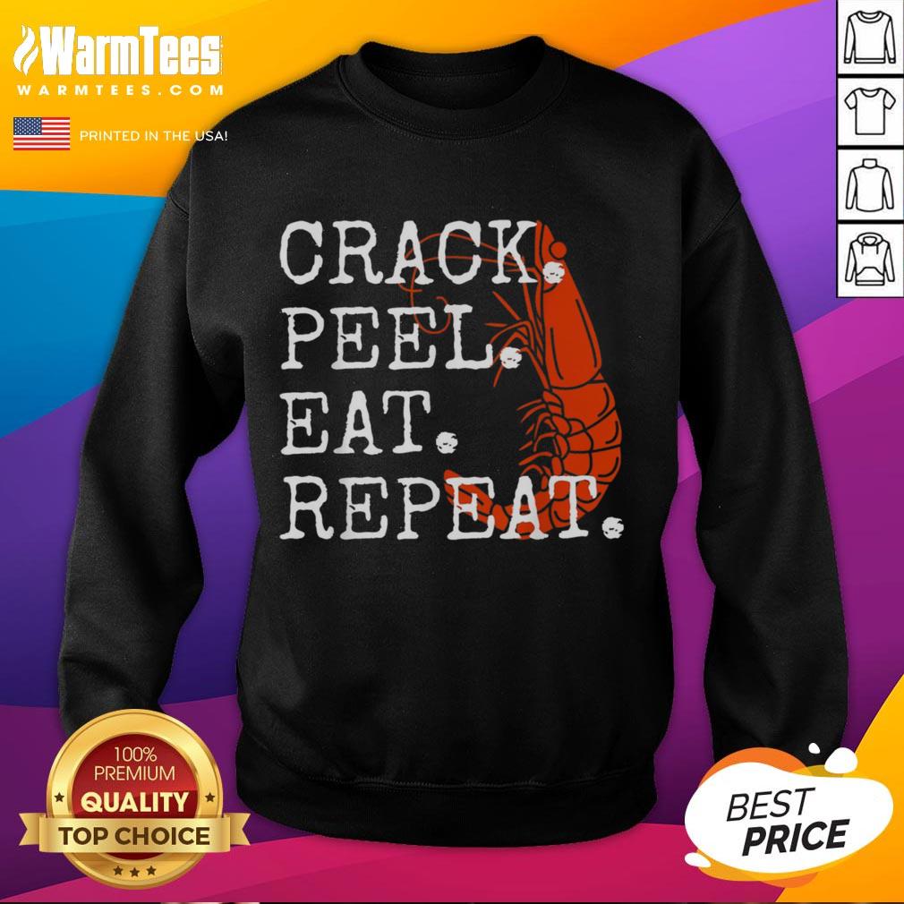 Alt Text: Funny seafood crack peel eat repeat shrimp sweatshirt design featuring playful graphics and vibrant colors.