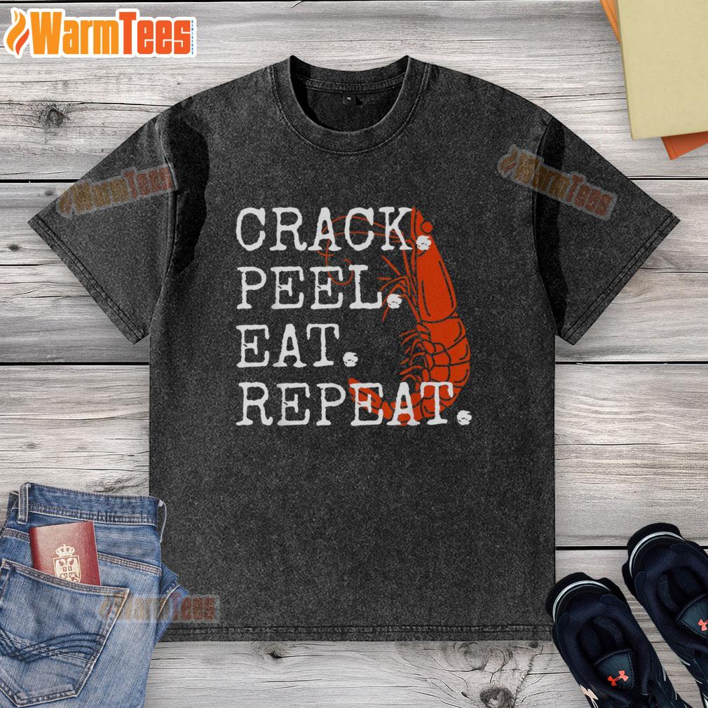 Funny seafood crack peel eat repeat shrimp design on a washed T-shirt, perfect for seafood lovers and casual wear.
