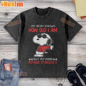 Funny Snoopy 'My Body Knows How Old I Am' washed t-shirt showcasing a playful design and vibrant colors.