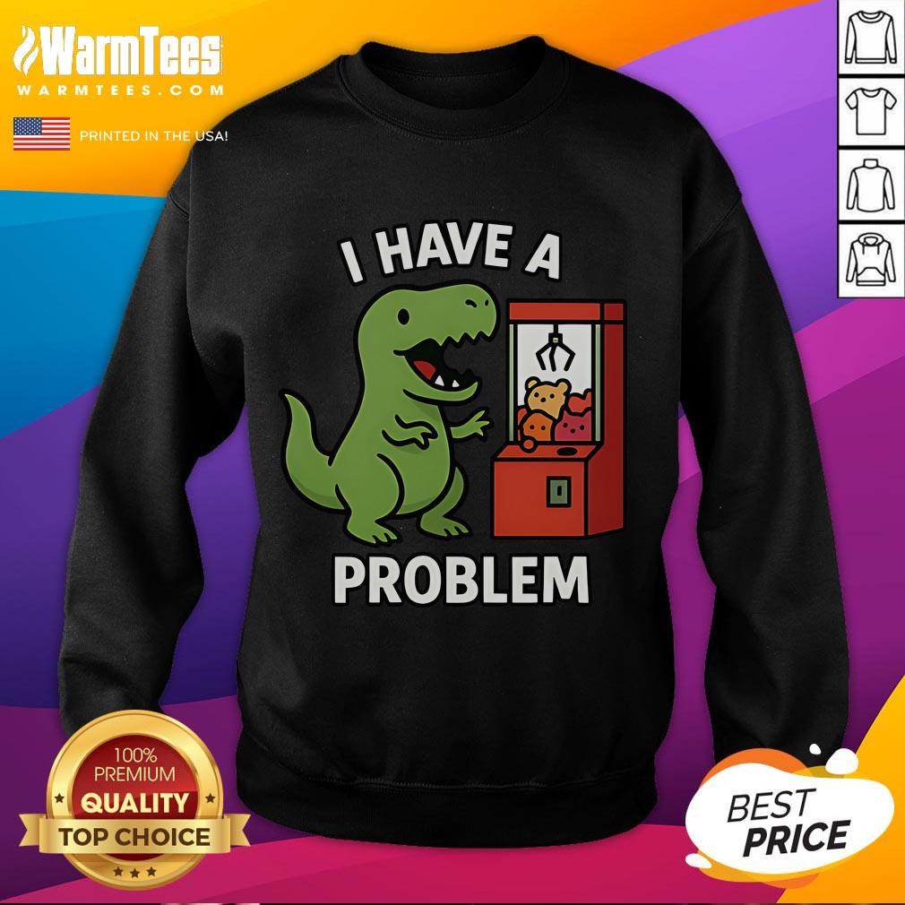 Funny T-Rex sweatshirt featuring a dinosaur with a claw machine, perfect for arcade gamers and casual wear enthusiasts.