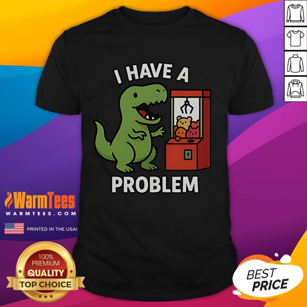 Alt Text: Funny T-Rex graphic on a gamer T-shirt, featuring I Have A Problem text for arcade claw machine enthusiasts.