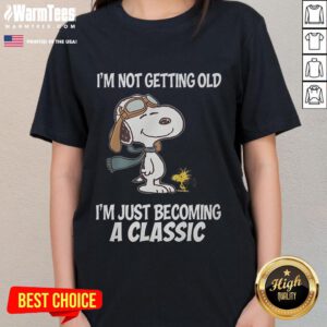 Funny Snoopy graphic on a ladies tee saying 'I'm not getting old, I'm just becoming a classic' - perfect for vintage fans.