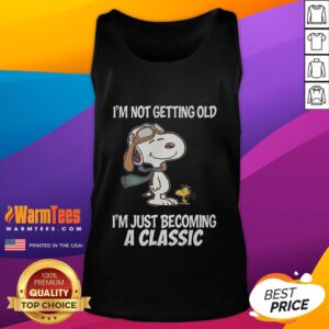Stylish Snoopy tank top with 'I'm Not Getting Old, I'm Just Becoming A Classic' text, perfect for casual wear.