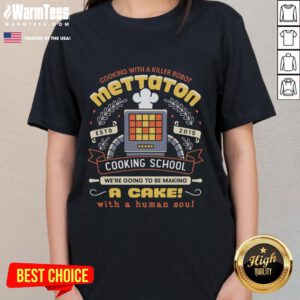 Official Mettaton Cooking School tee featuring a cake with a human soul crest, perfect for fans of Undertale merchandise.
