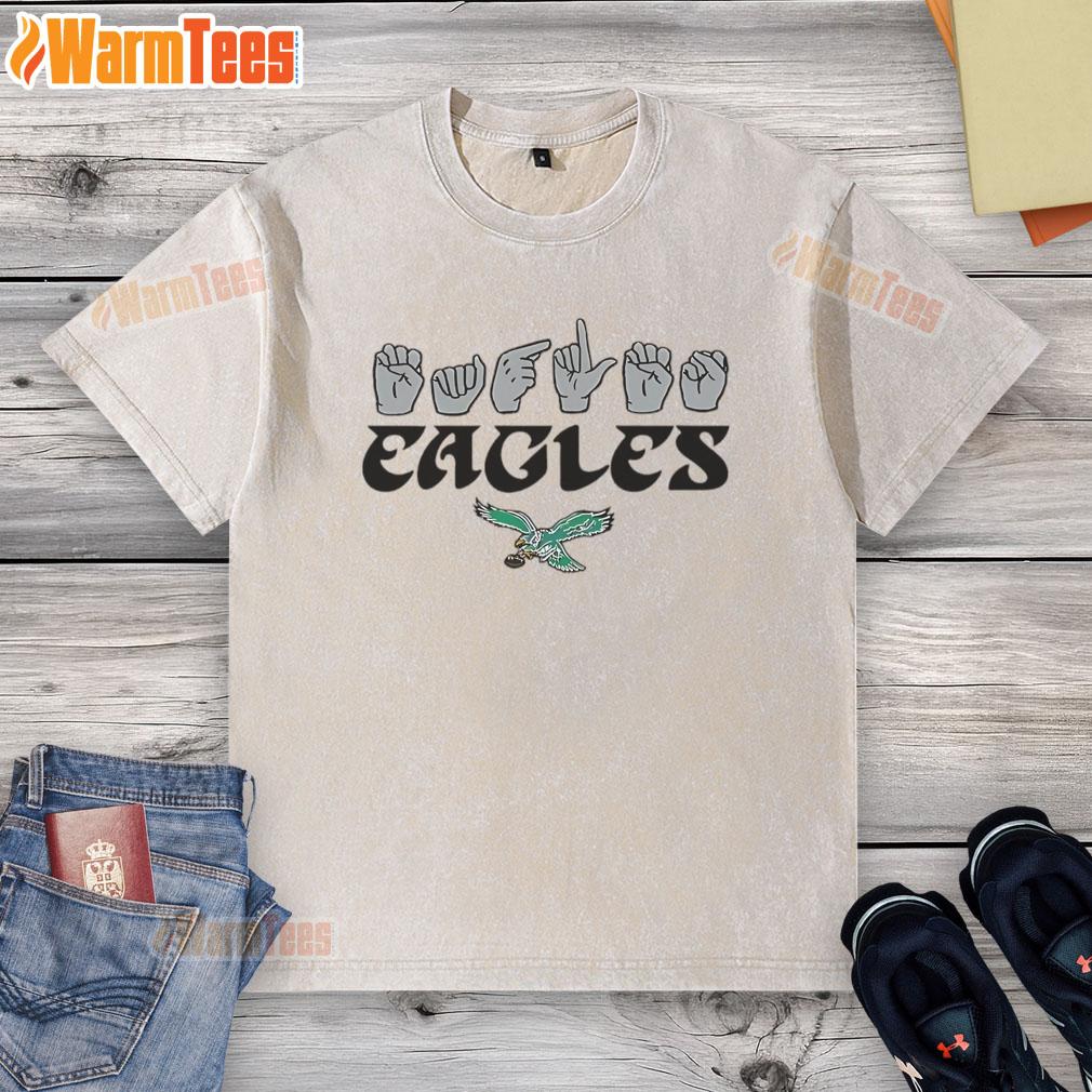Youth in an Official Philadelphia Eagles Football t-shirt shows love with hand signals, celebrating their team spirit.