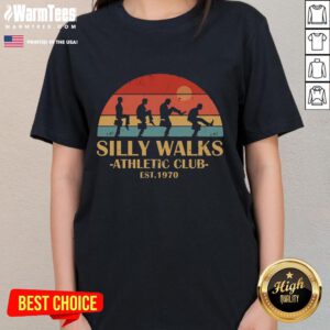 Vintage sunset ladies tee from Official Silly Walks Athletic Club, est. 1970, showcasing a playful design and retro style.