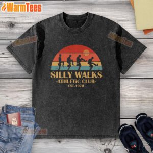 Vintage sunset-washed t-shirt for Official Silly Walks Athletic Club, est. 1970, featuring whimsical design and retro style.