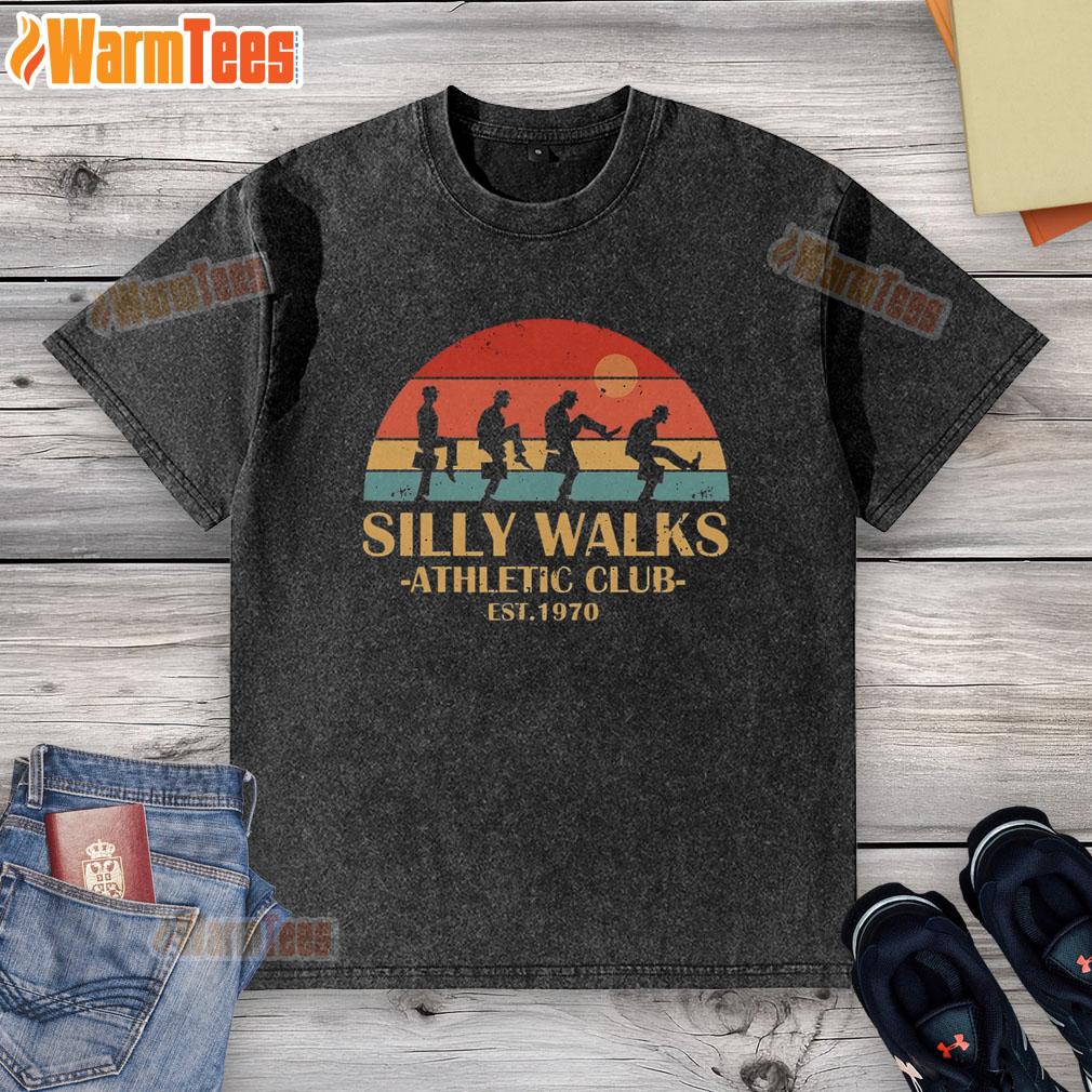 Vintage sunset-washed t-shirt for Official Silly Walks Athletic Club, est. 1970, featuring whimsical design and retro style.