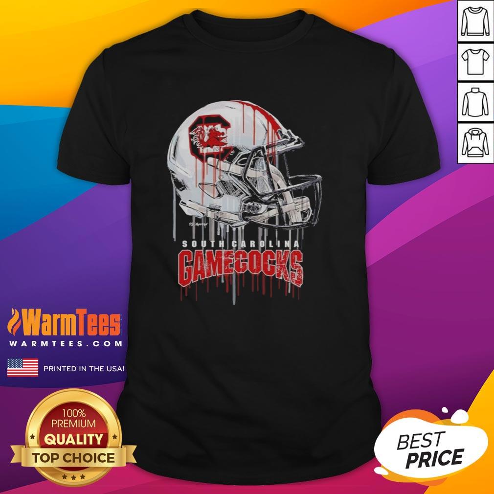 Premium South Carolina Gamecocks dripping football helmet t-shirt showcasing team spirit and style for fans.