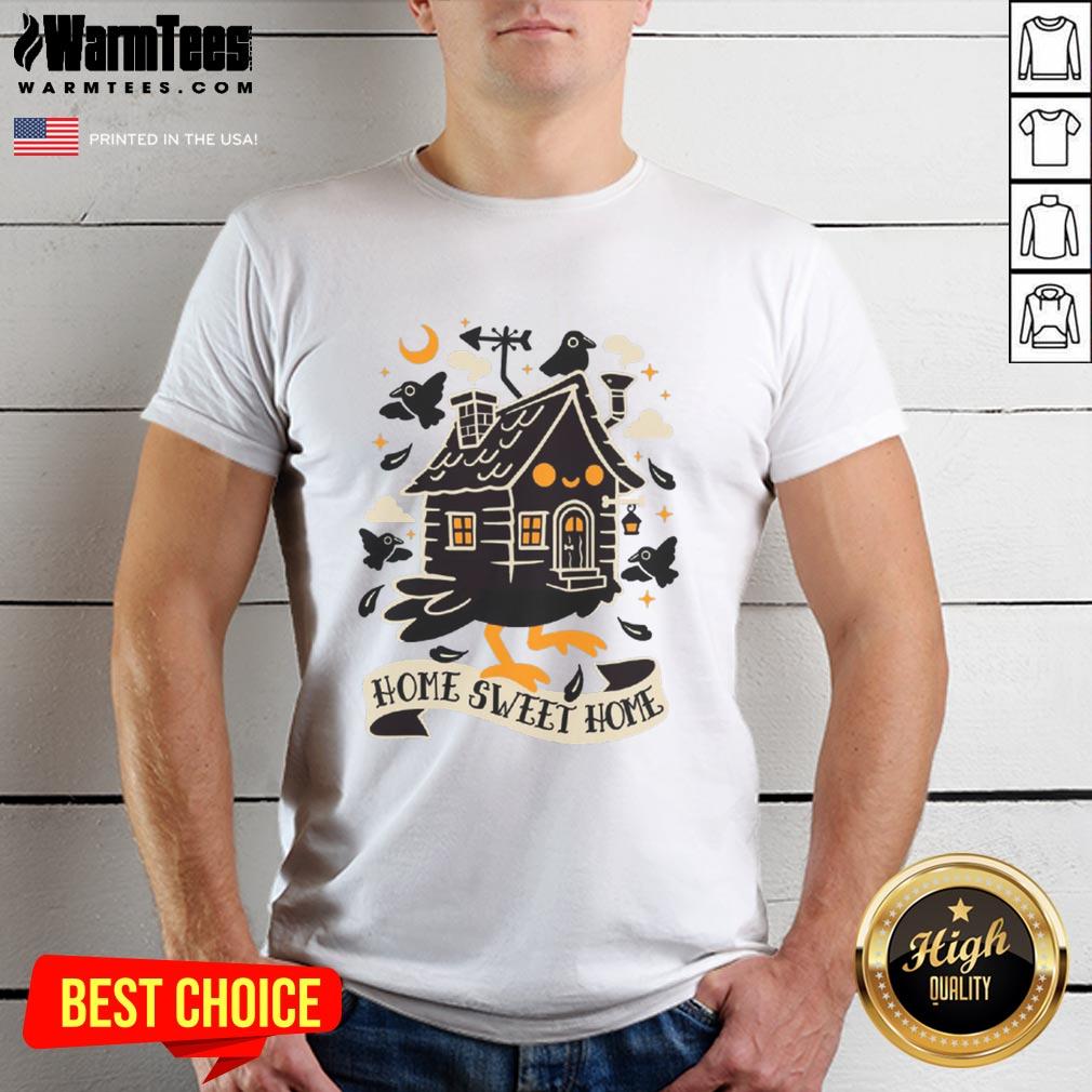 Alt Text: Cute Baba Yaga Sweet Home T-Shirt featuring a whimsical design of Baba Yaga's hut and magical elements.