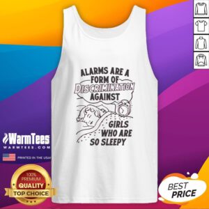 Girl wearing a 'Good Alarms Are A Form Of Discrimination Against Girls Who Are So Sleepy' tank top, smiling in a cozy setting.
