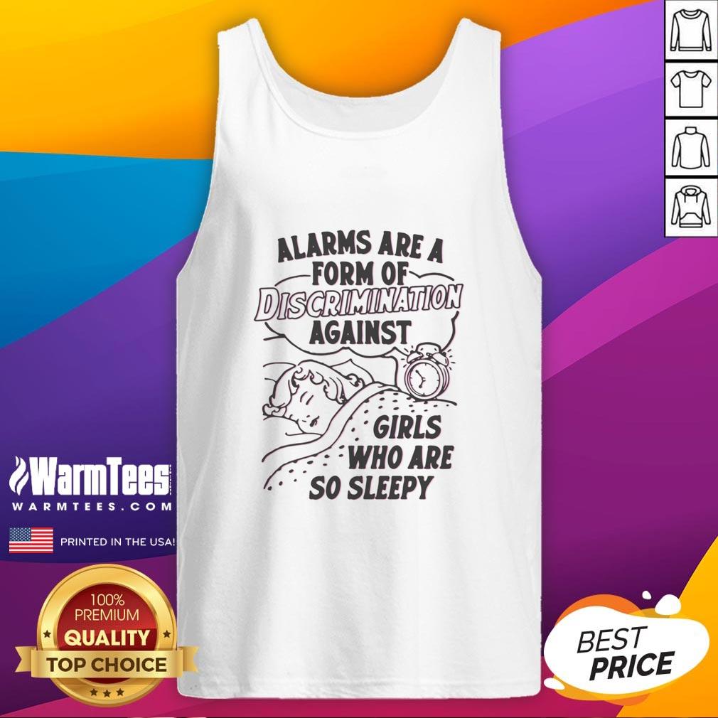Girl wearing a 'Good Alarms Are A Form Of Discrimination Against Girls Who Are So Sleepy' tank top, smiling in a cozy setting.