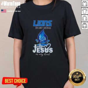 Detroit Lions ladies tee with 'Good in My Veins, Jesus in My Heart' design, perfect for football lovers.