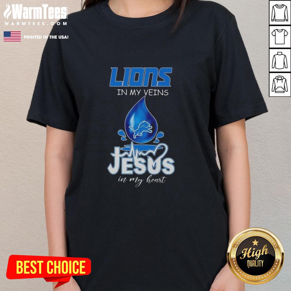 Detroit Lions ladies tee with 'Good in My Veins, Jesus in My Heart' design, perfect for football lovers.