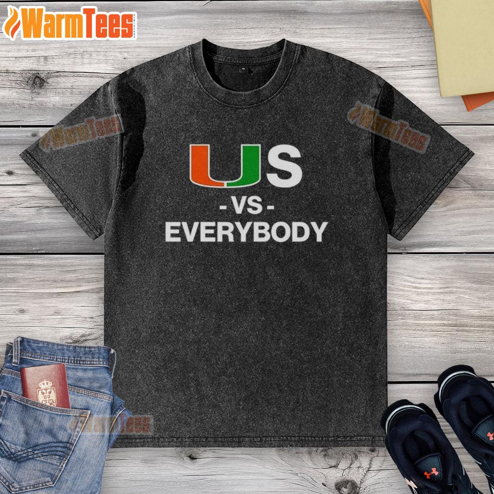Alt Text: Good Miami Hurricanes Us Vs Everybody washed t-shirt featuring a bold graphic design and vibrant team colors.