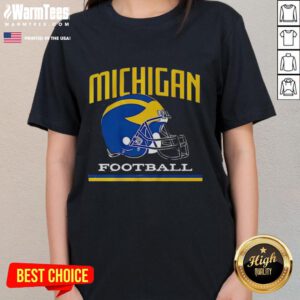 Alt Text: Vintage ladies tee featuring the iconic Michigan Wolverines football helmet design for passionate fans.