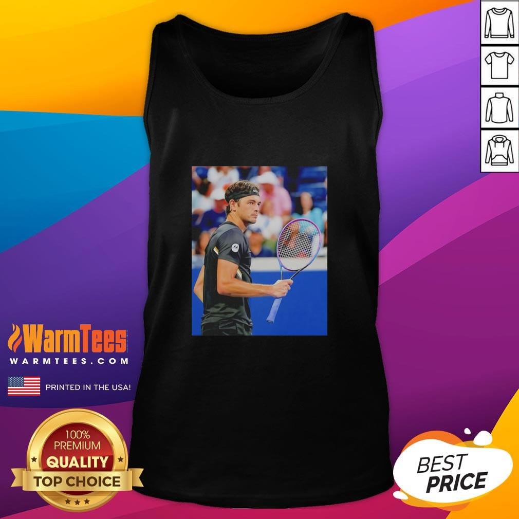 Hot Taylor Fritz at the 2025 US Open wearing a stylish tank top, showcasing his athleticism and tennis skills.